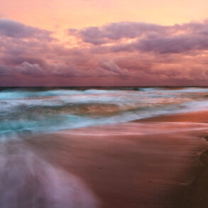 A long exposure photo taken at sunset on the beach in South Florida